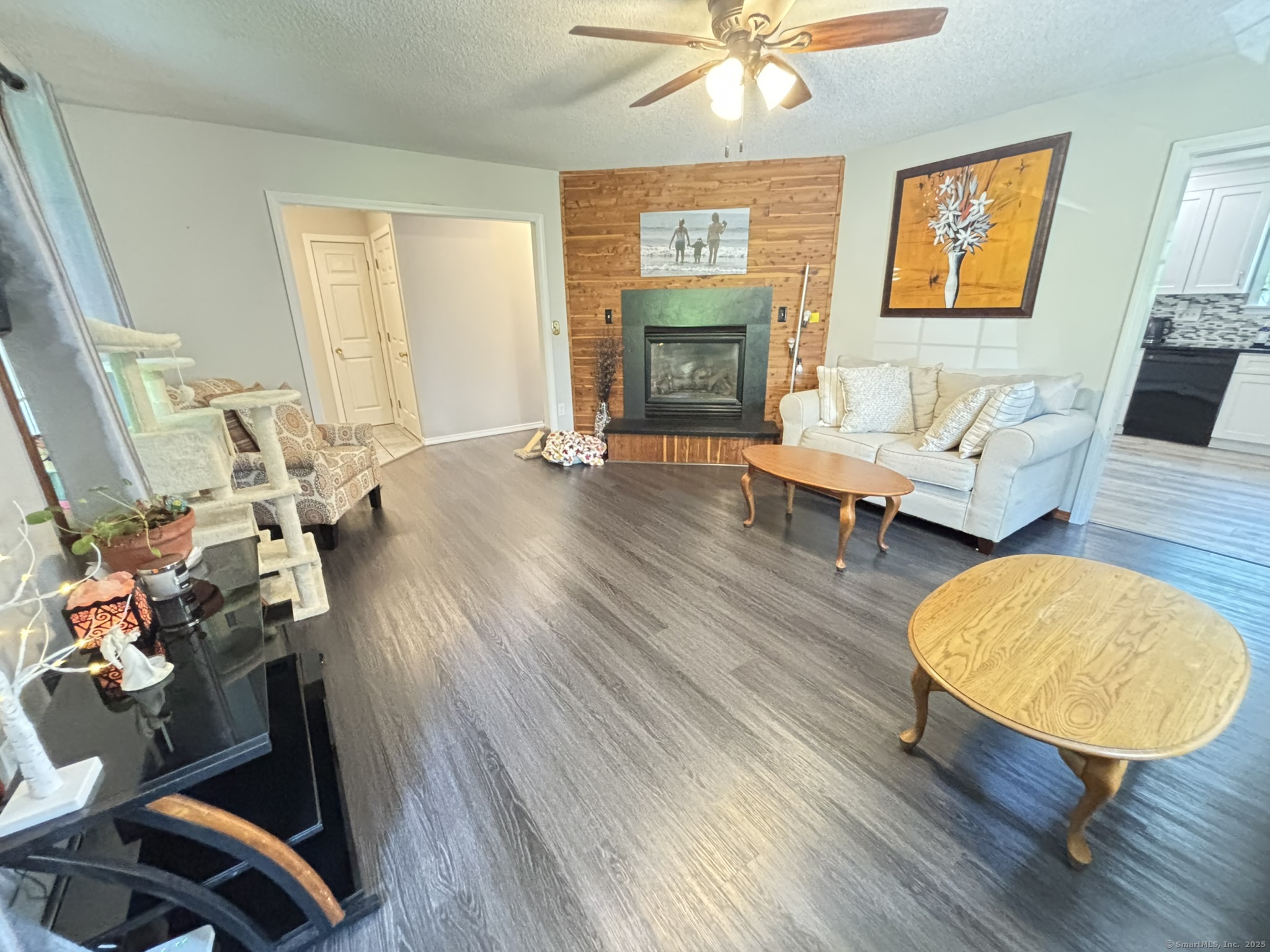16 Plank Road Prospect, CT 06712 - Photo 11 of 40 an outdoor living room with furniture and a fireplace