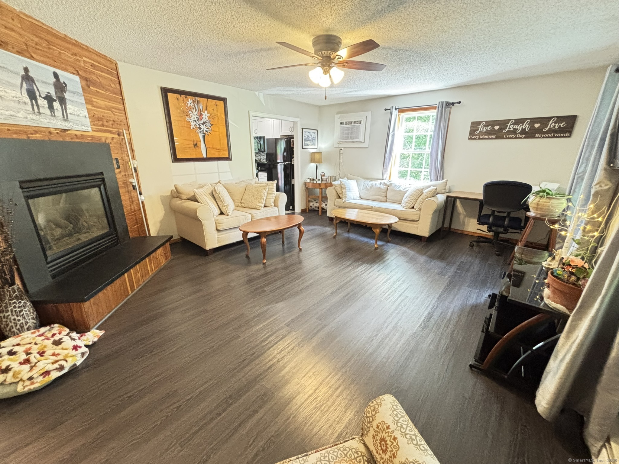 16 Plank Road Prospect, CT 06712 - Photo 13 of 40 a living room with furniture floor to ceiling window and a flat screen tv