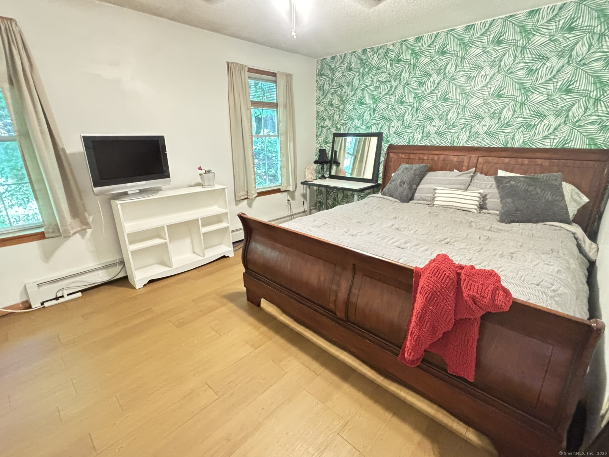 16 Plank Road Prospect, CT 06712 - Photo 15 of 40 a living room with a bed furniture and next to a window