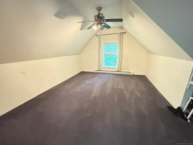 a bathroom with a bathtub sink and toilet