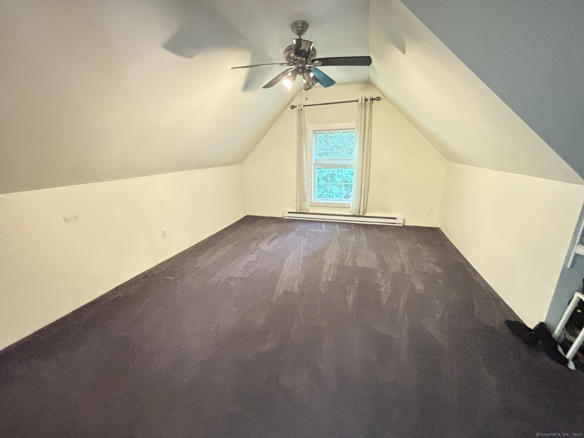 16 Plank Road Prospect, CT 06712 - Photo 22 of 40 an empty room with a window and a ceiling fan
