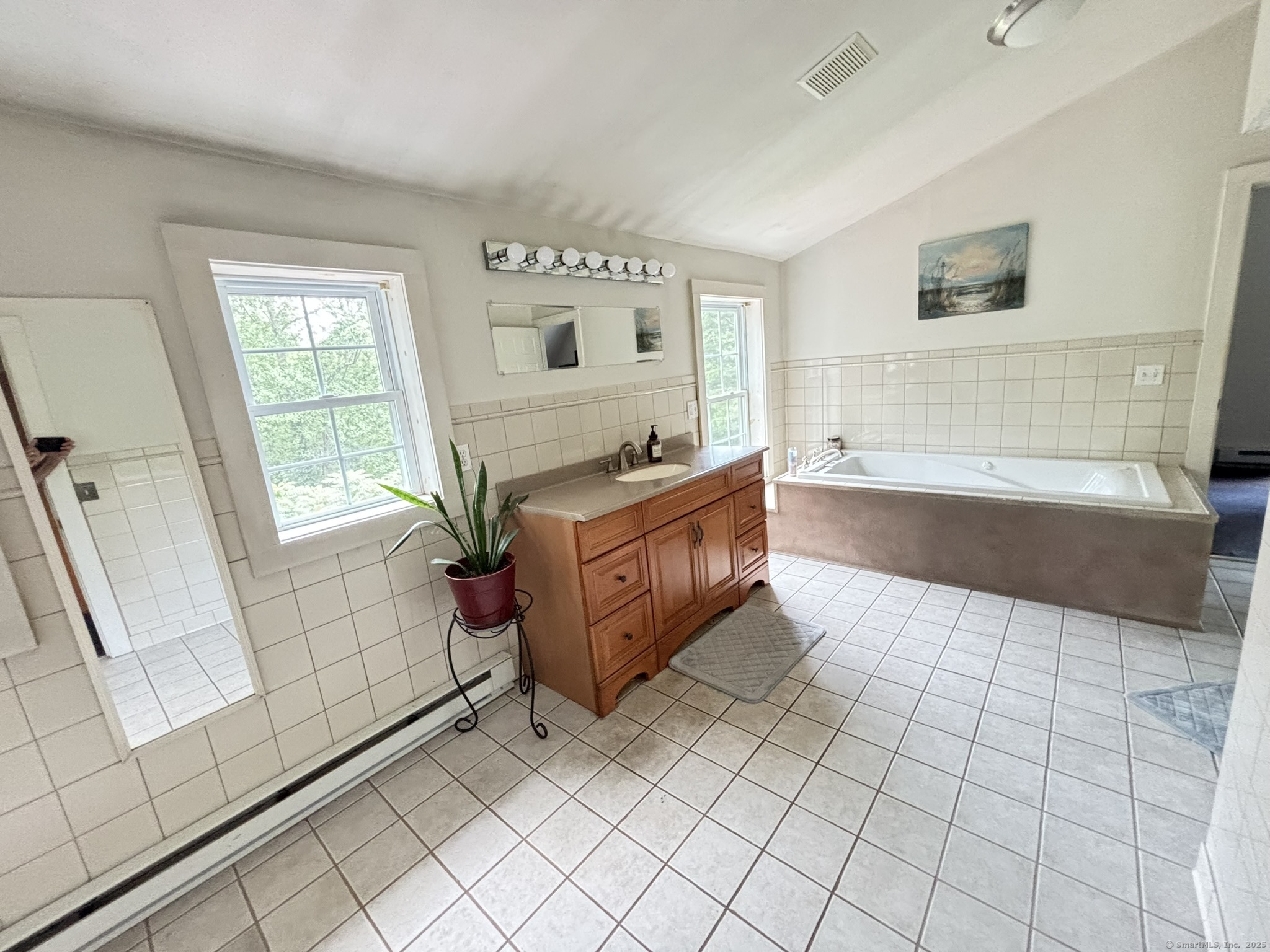 16 Plank Road Prospect, CT 06712 - Photo 25 of 40 a spacious bathroom with a bathtub and a shower