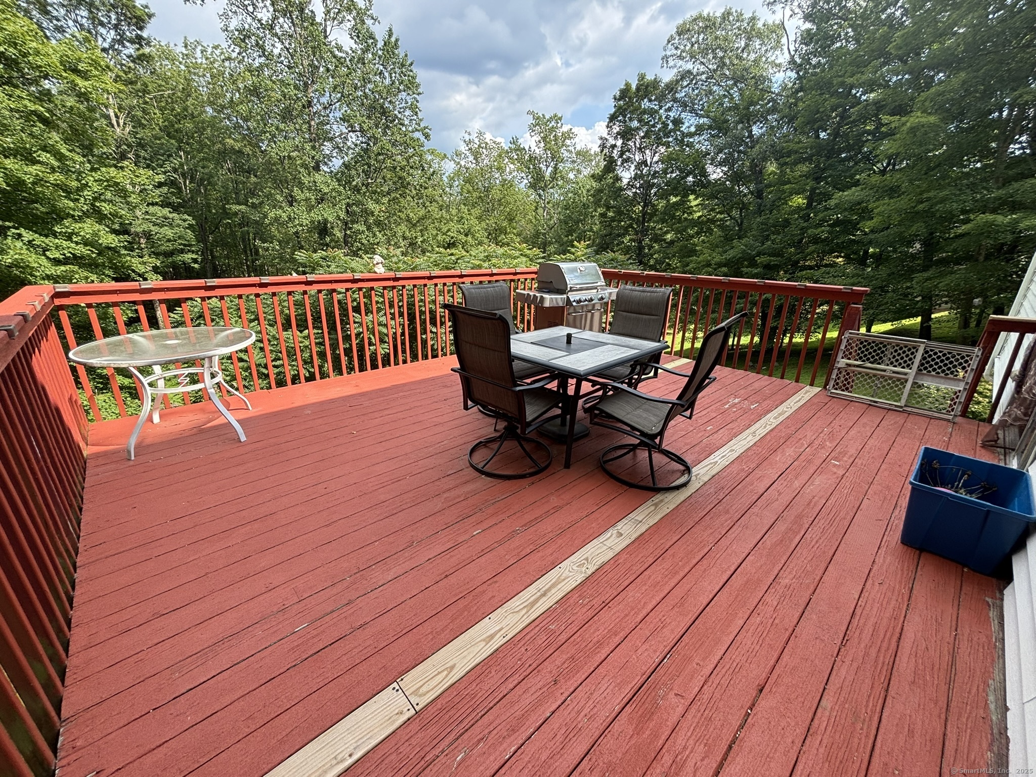 16 Plank Road Prospect, CT 06712 - Photo 28 of 40 a view of deck with chairs and wooden floor