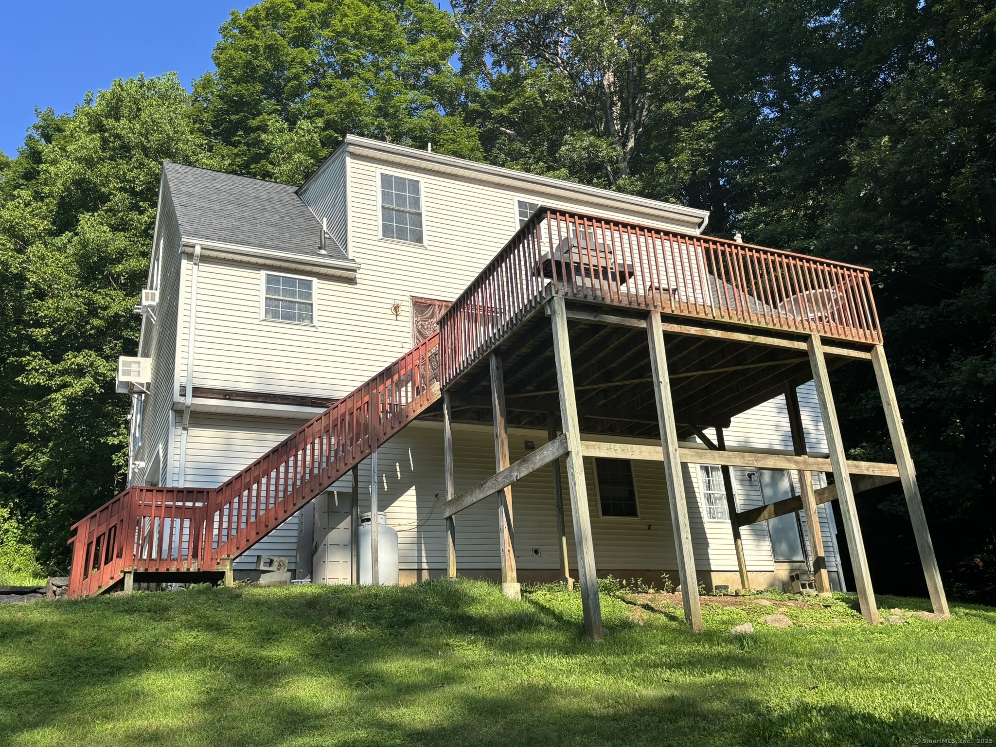 16 Plank Road Prospect, CT 06712 - Photo 29 of 40 a view of a house with a deck
