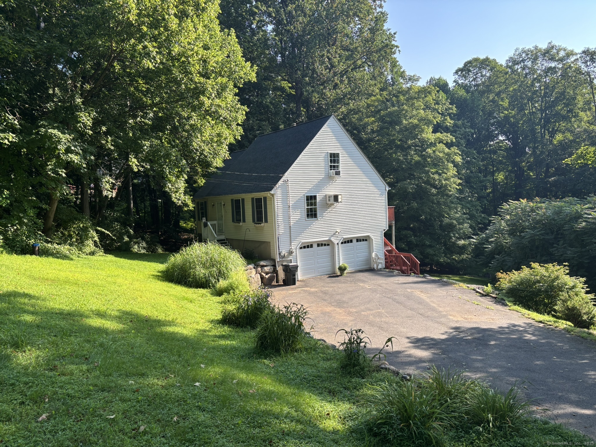 16 Plank Road Prospect, CT 06712 - Photo 3 of 40 a view of backyard of house with green space