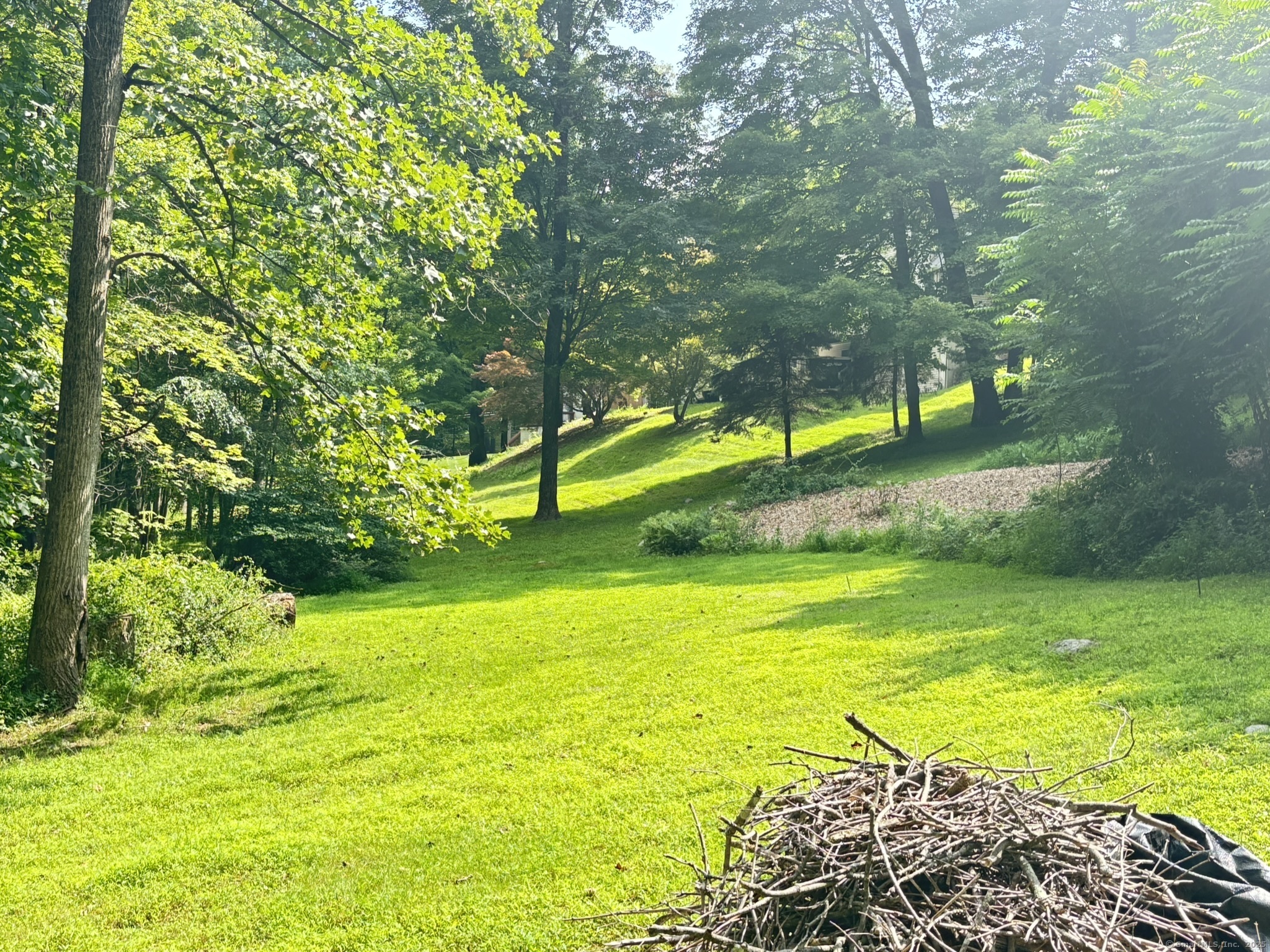 16 Plank Road Prospect, CT 06712 - Photo 38 of 40 a view of a swimming pool with an outdoor space and seating area