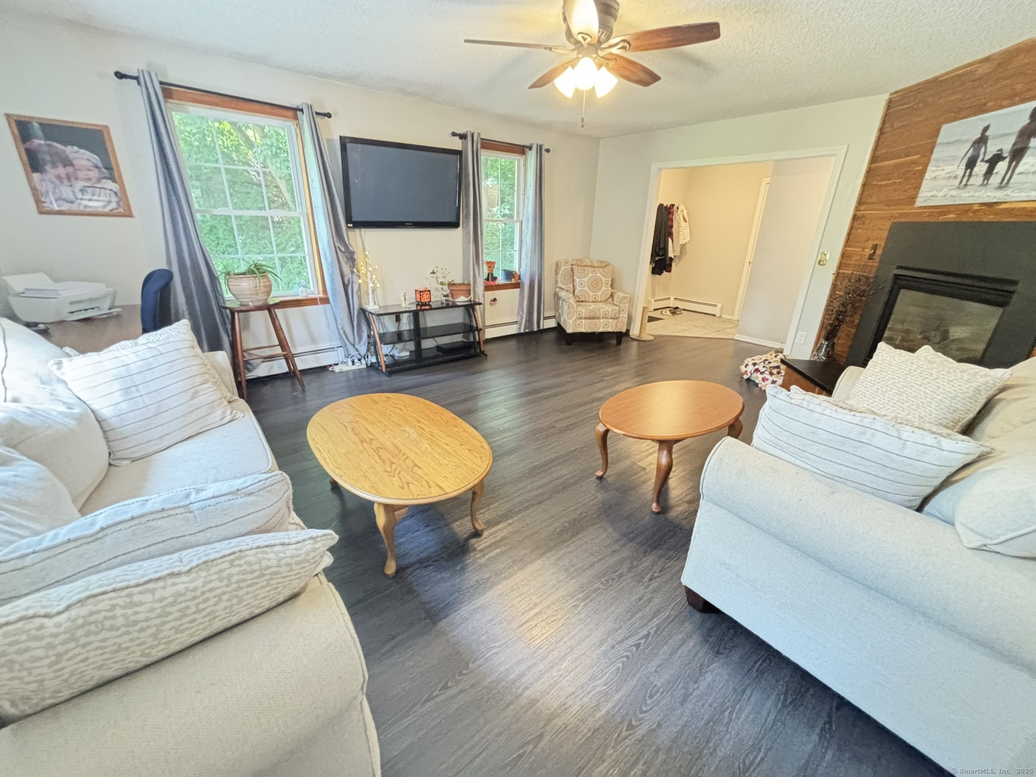 16 Plank Road Prospect, CT 06712 - Photo 9 of 40 a living room with furniture and a flat screen tv