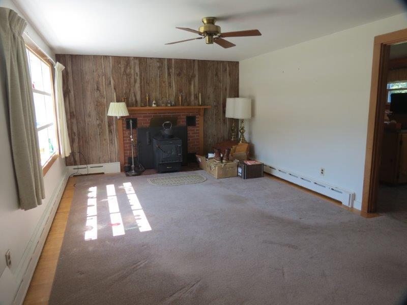 64 Bull Ring Road Hiram, ME 04041 - Photo 13 of 34 Livingroom. Door to the right goes...