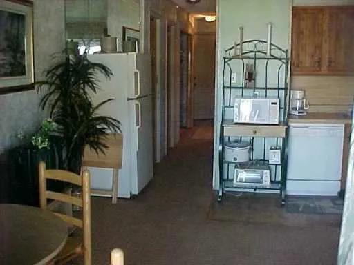 a room with table and chairs