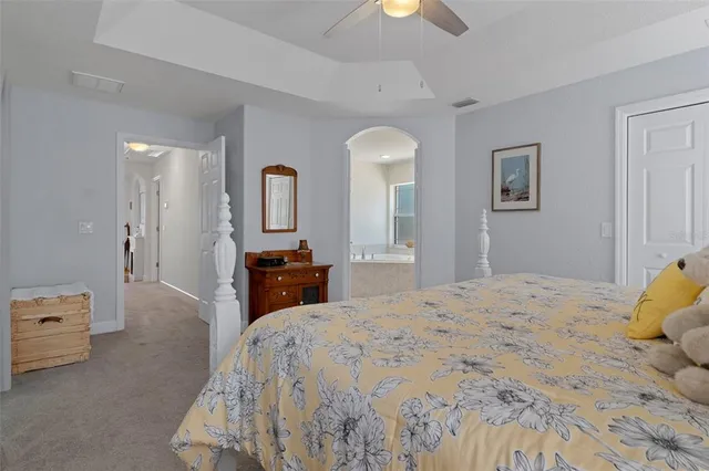 a bath room with a sink and a mirror