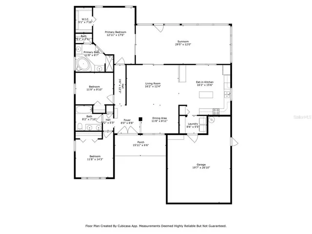 a living room with furniture and a view of bedroom