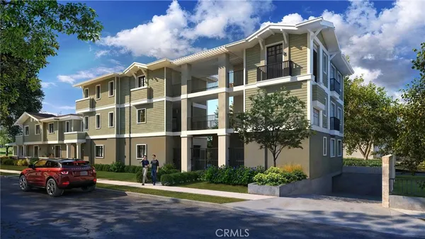 a front view of a building with garden