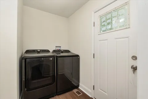 a view of a utility room with washer and dryer