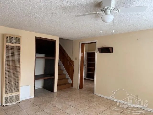 a view of a kitchen with a sink dishwasher and a refrigerator