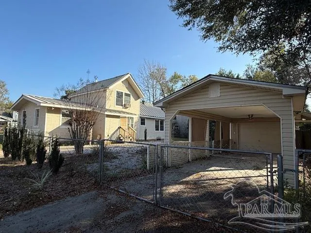 a front view of a house with yard