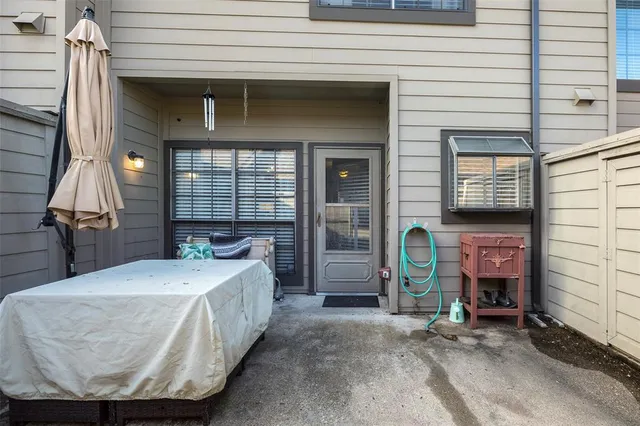 a view of a house with tub and door