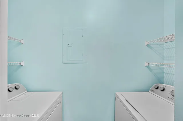 a view of a patio with couches and table and chairs and potted plants