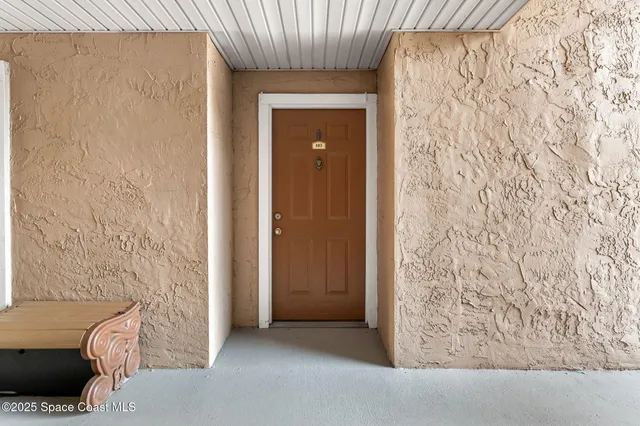 a kitchen with granite countertop a stove and a sink