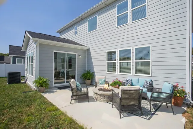 a front view of a building and a yard