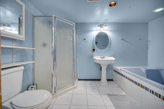 a view of road with large trees