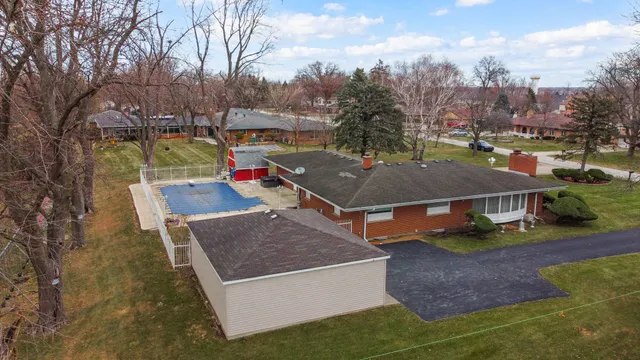 aerial view of a house with swimming pool
