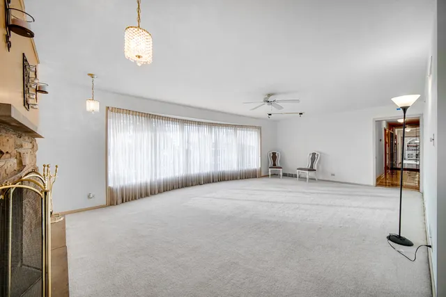 a view of a livingroom with a fireplace