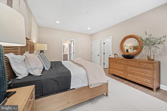 a bedroom with bed and a window