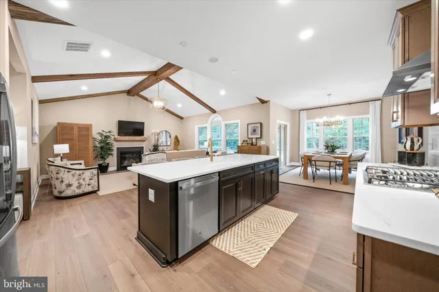 a kitchen with a stove and a refrigerator