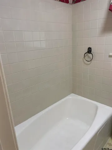 a bathroom with a bathtub