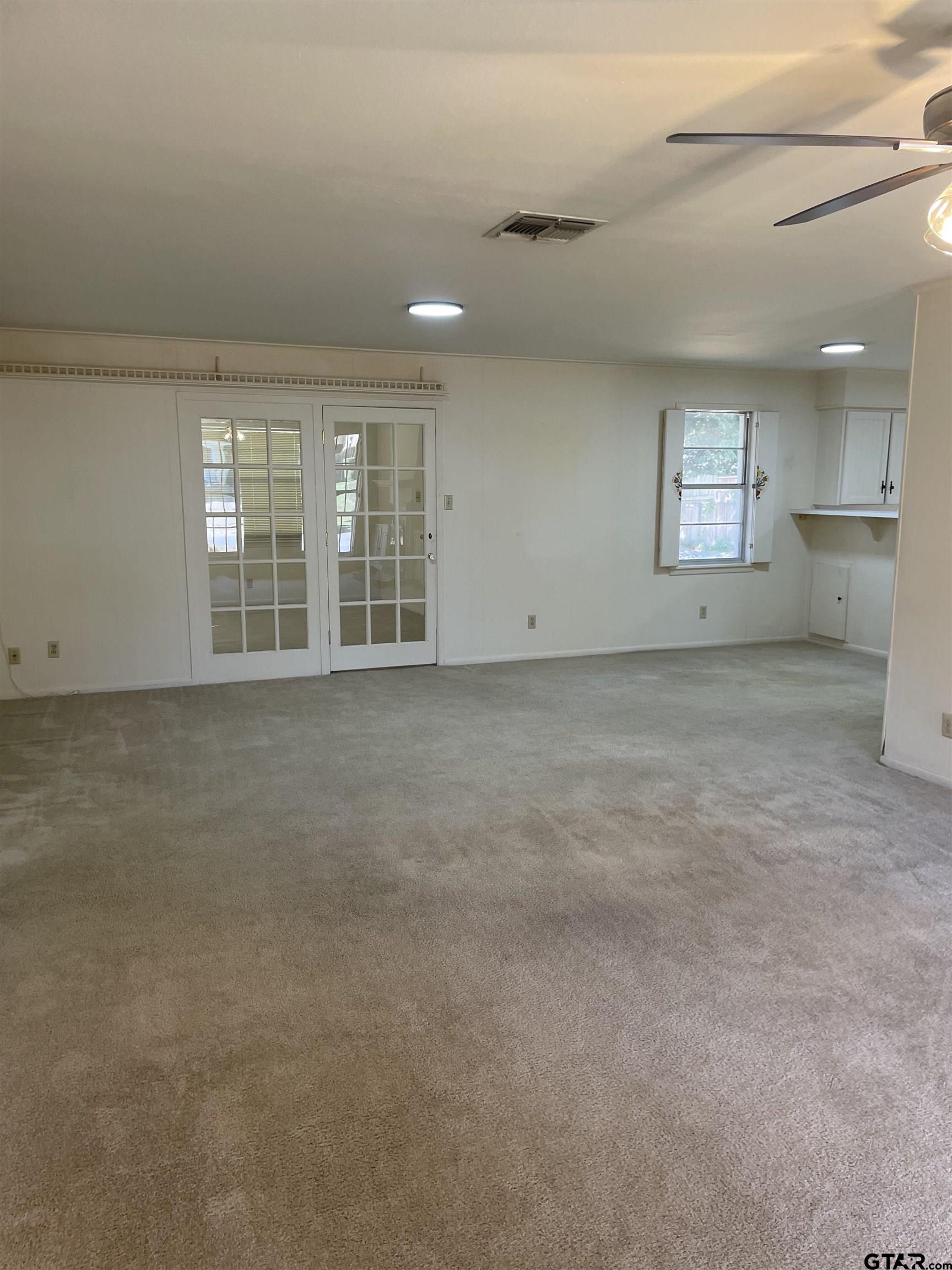 2523 Shenandoah Drive Tyler, TX 75701 - Photo 6 of 26 a view of an empty room with a window