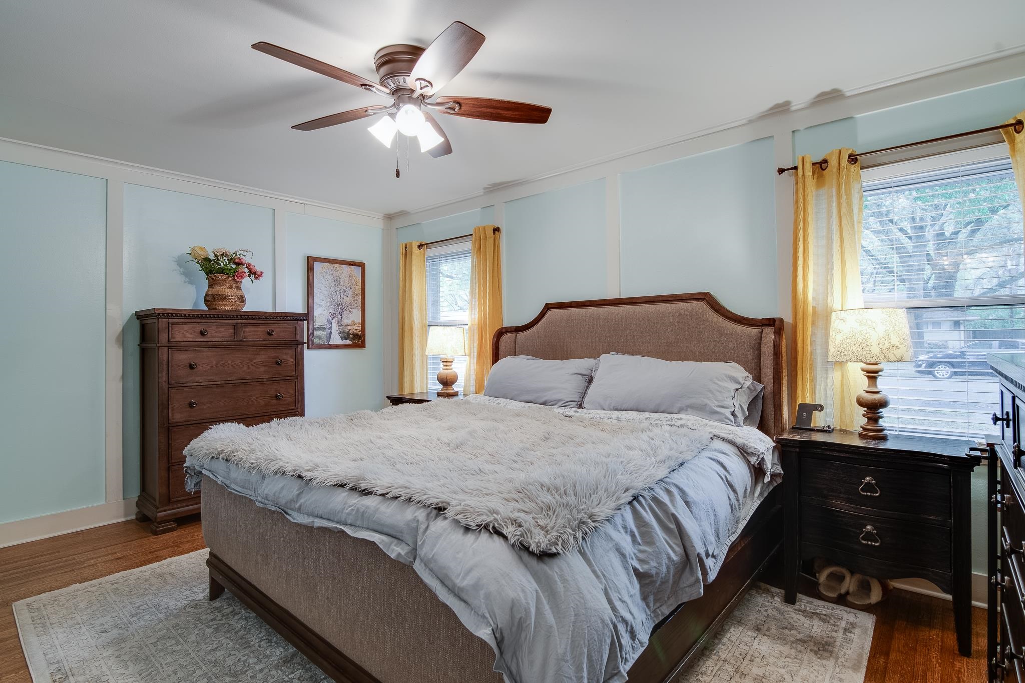 4898 Dee Road Memphis, TN 38117 - Photo 25 of 40 a bedroom with a bed and a chandelier