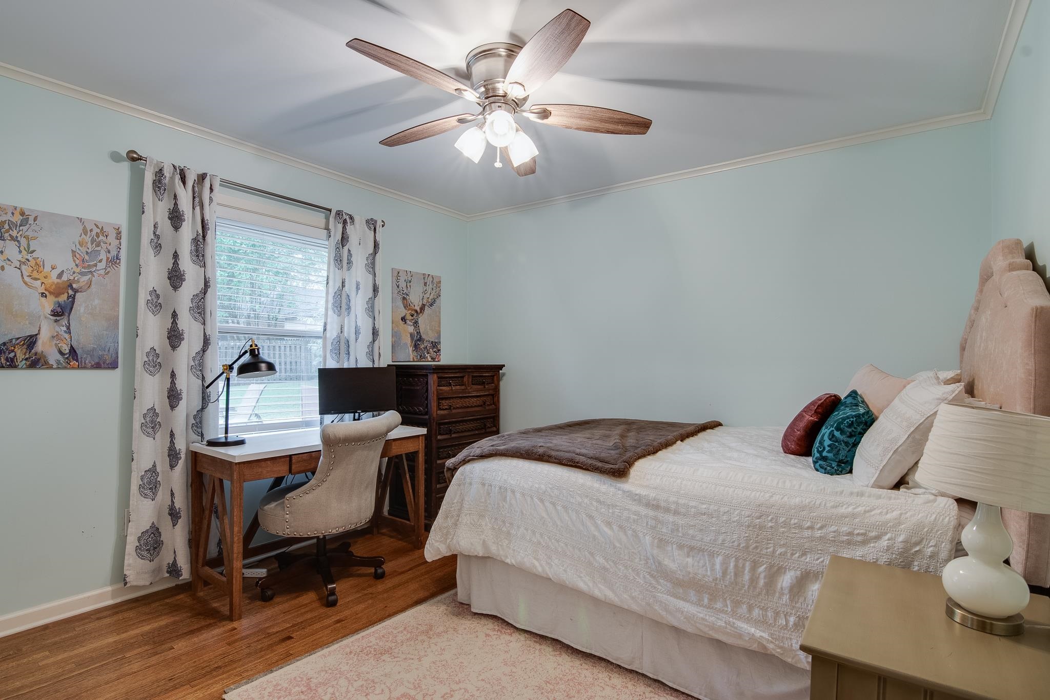 4898 Dee Road Memphis, TN 38117 - Photo 29 of 40 a bedroom that has a bed and a desk in it
