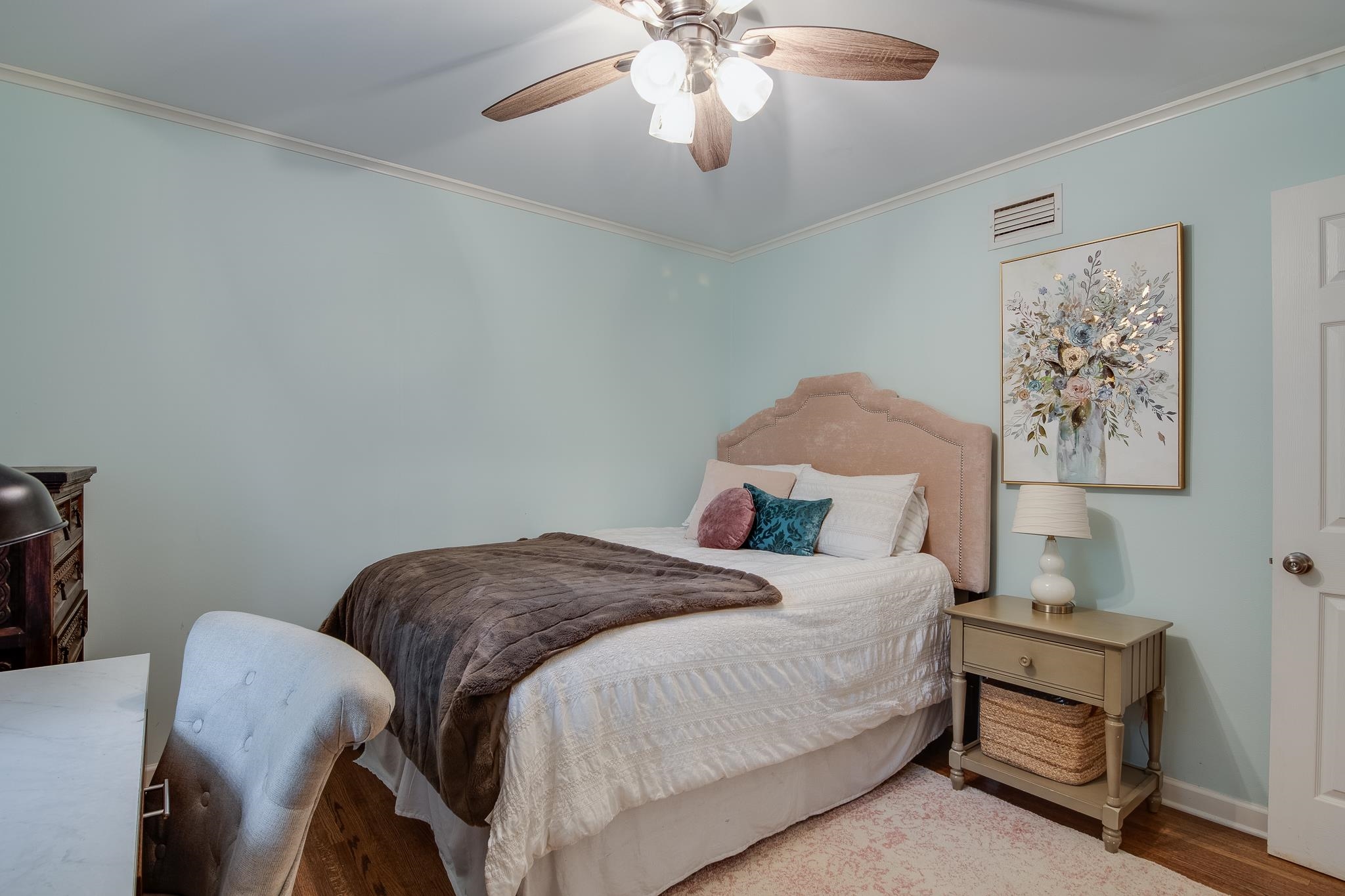 4898 Dee Road Memphis, TN 38117 - Photo 30 of 40 a bedroom with a bed and a chandelier