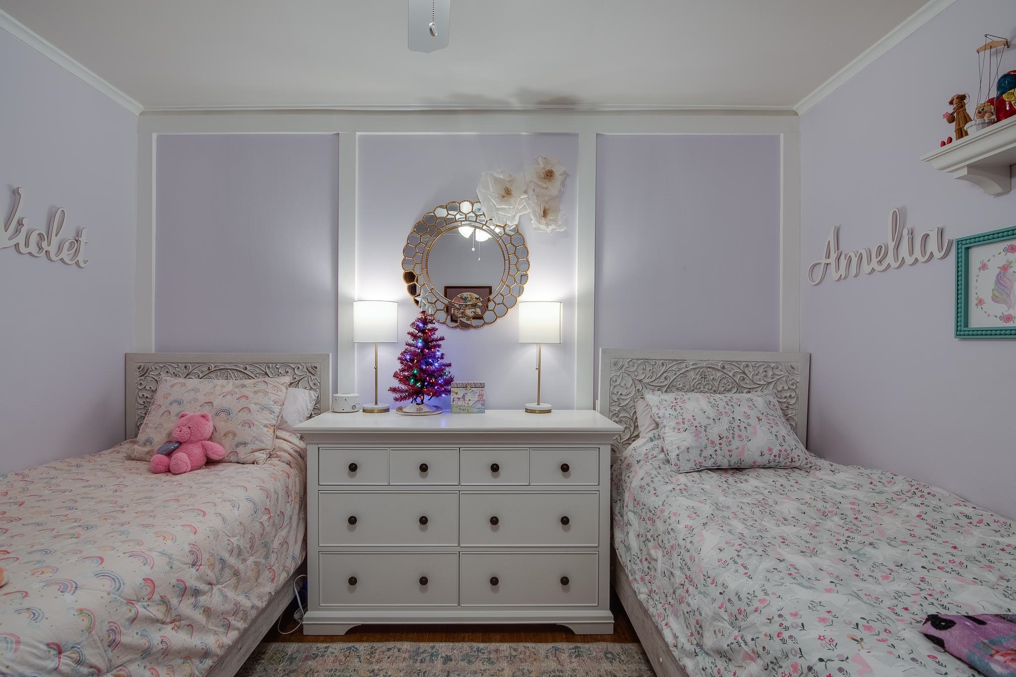 4898 Dee Road Memphis, TN 38117 - Photo 34 of 40 a bedroom with a bed and wooden floor