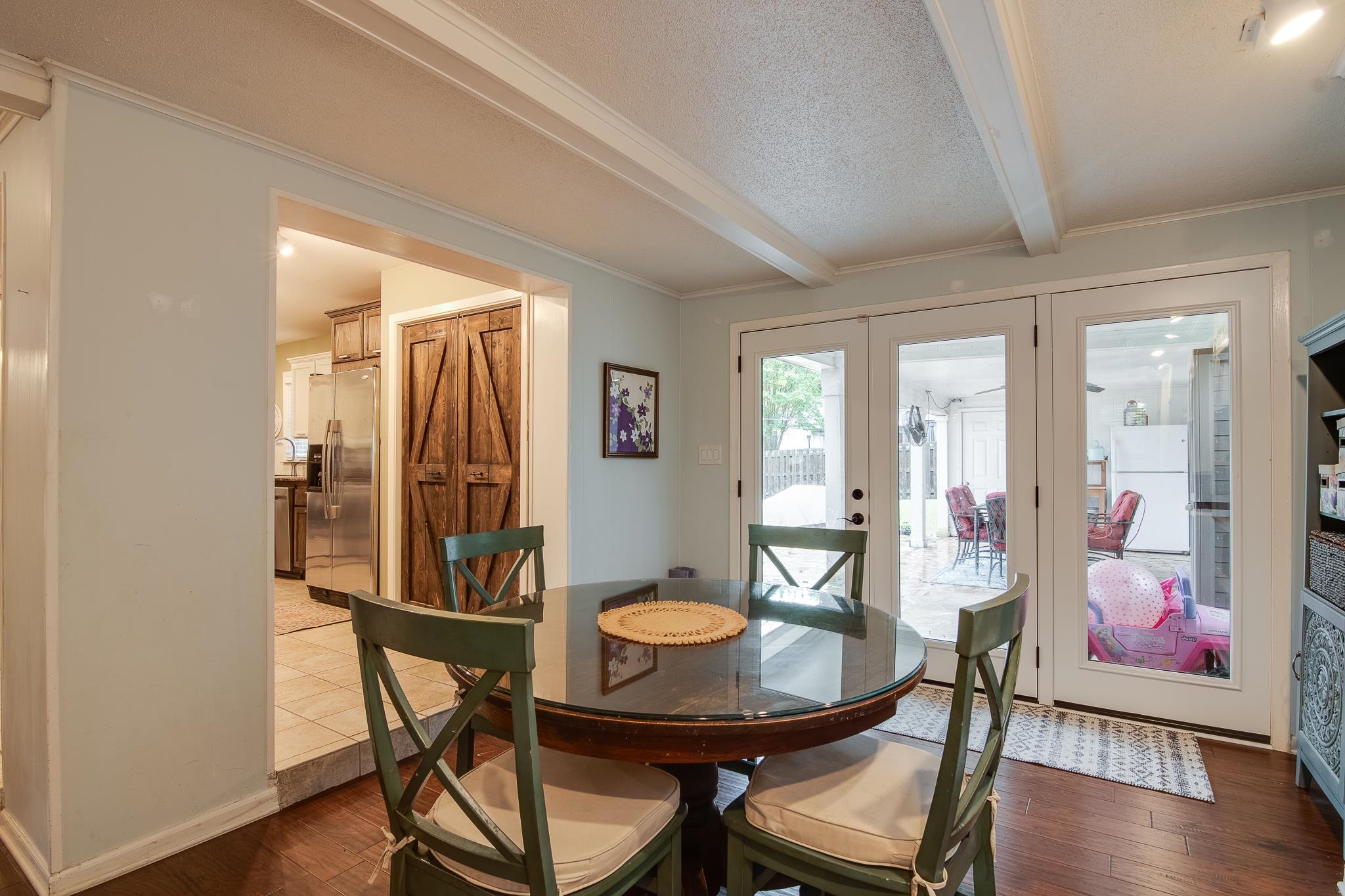 4898 Dee Road Memphis, TN 38117 - Photo 9 of 40 a view of a dining room with furniture and wooden floor