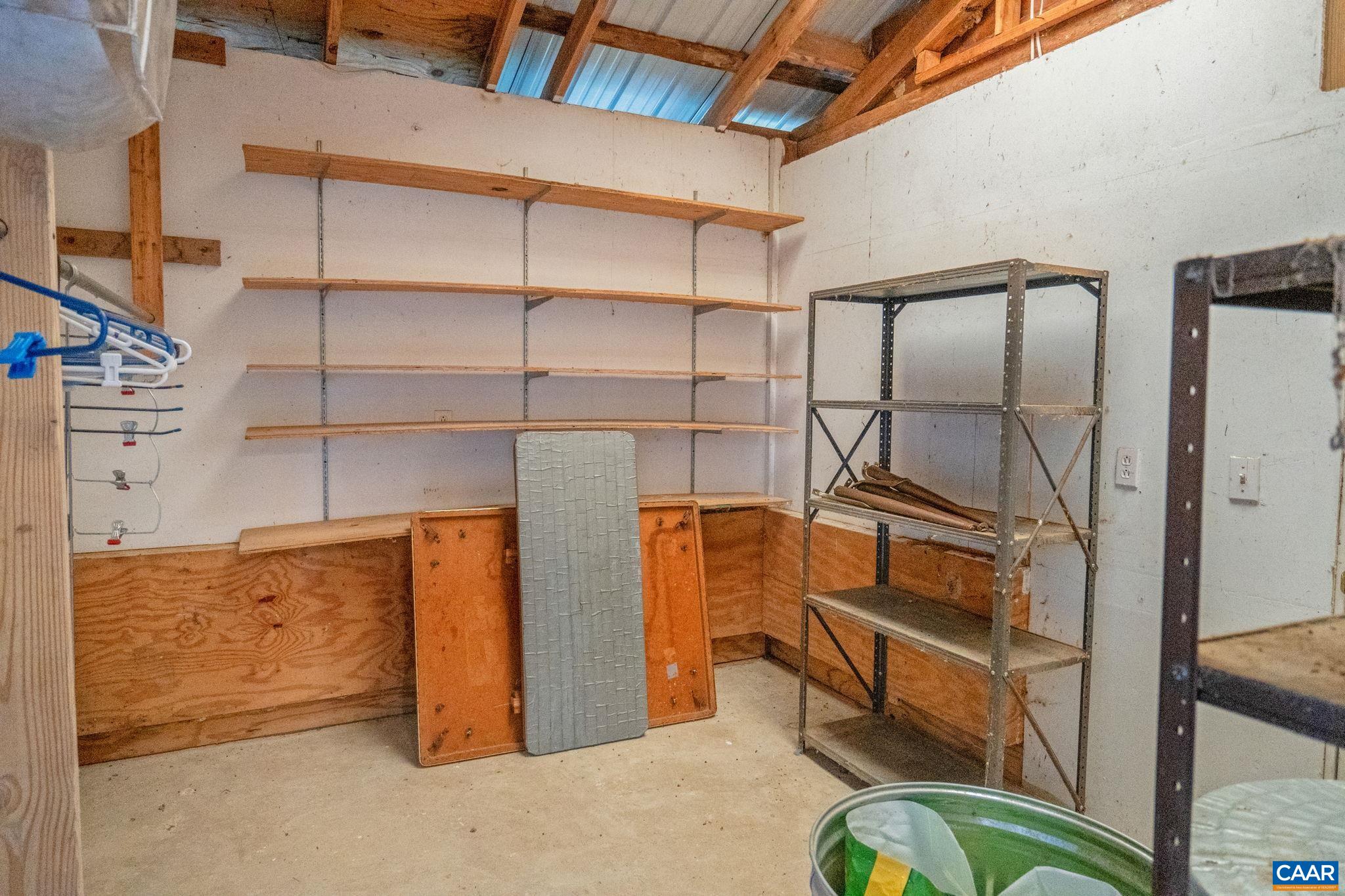 3535 Venable Road Kents Store, VA 23084 - Photo 45 of 75 a view of a room with racks on the wall
