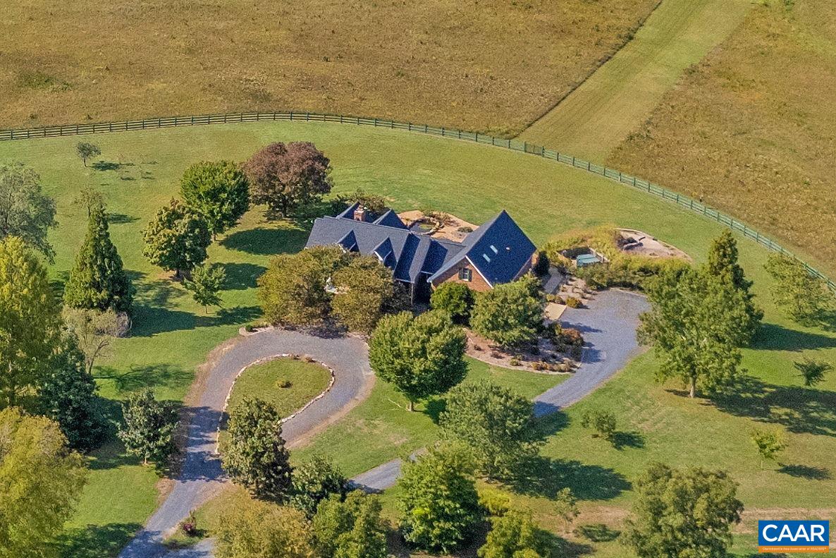 3535 Venable Road Kents Store, VA 23084 - Photo 5 of 75 an aerial view of a house with a lake view