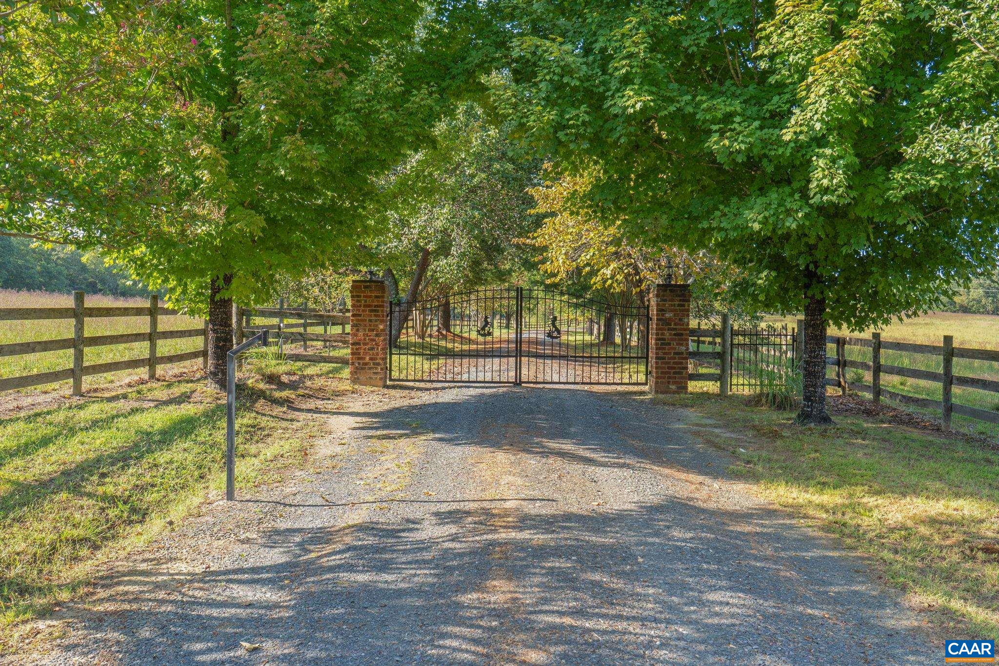 3535 Venable Road Kents Store, VA 23084 - Photo 61 of 75 a view of a yard with wooden fence