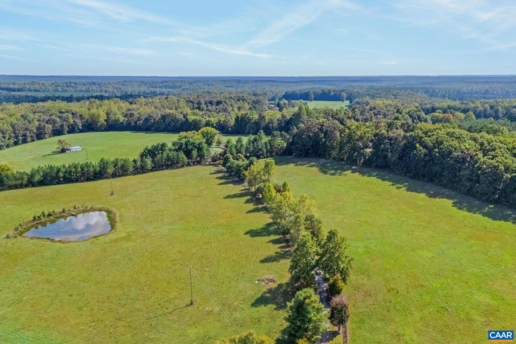 3535 Venable Road Kents Store, VA 23084 - Photo 73 of 75 a view of a lake with a city