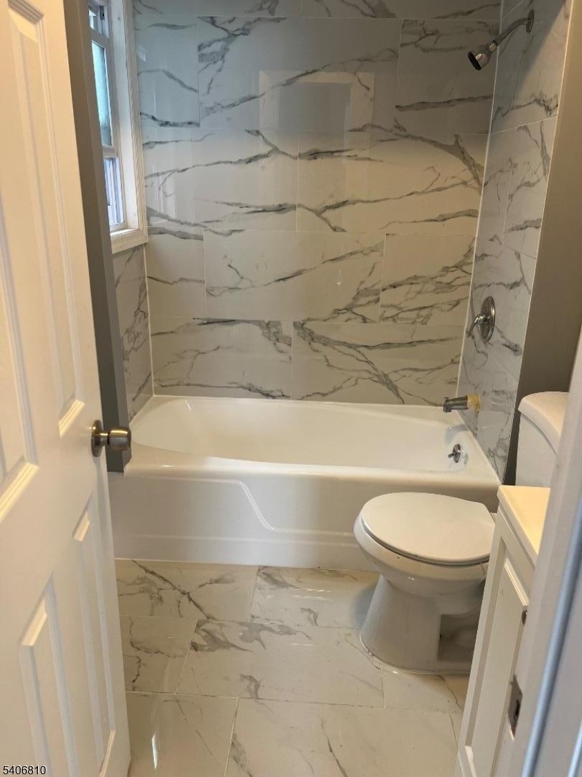 814 South 19th Street Newark, NJ 07108 - Photo 11 of 16 a bathroom with a toilet and a shower