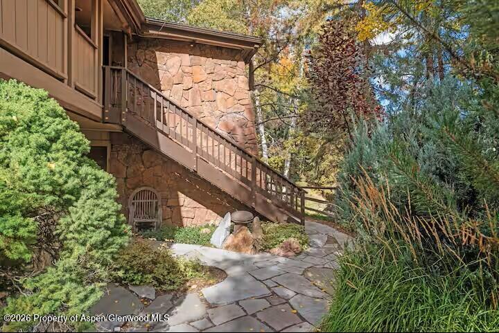 107 Aspen Mountain Road, Unit 9 Aspen, CO 81611 - Photo 15 of 19 a view of entryway with wooden floor