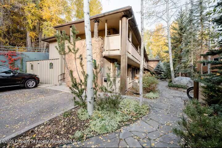 107 Aspen Mountain Road, Unit 9 Aspen, CO 81611 - Photo 16 of 19 a view of a street with cars
