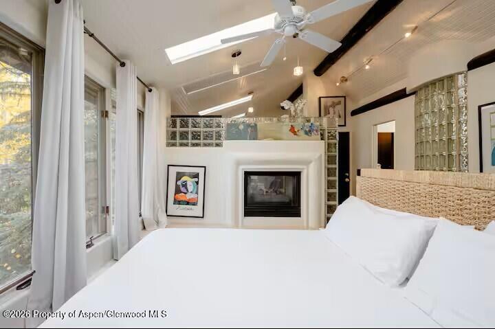 107 Aspen Mountain Road, Unit 9 Aspen, CO 81611 - Photo 6 of 19 a view of a hallway with an empty room and fire place