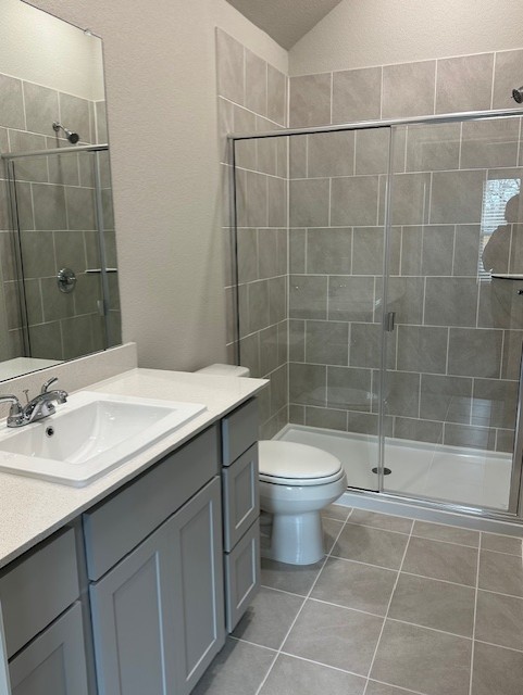 332 Bendecido Loop Elgin, TX 78621 - Photo 17 of 39 a bathroom with a toilet a sink and shower
