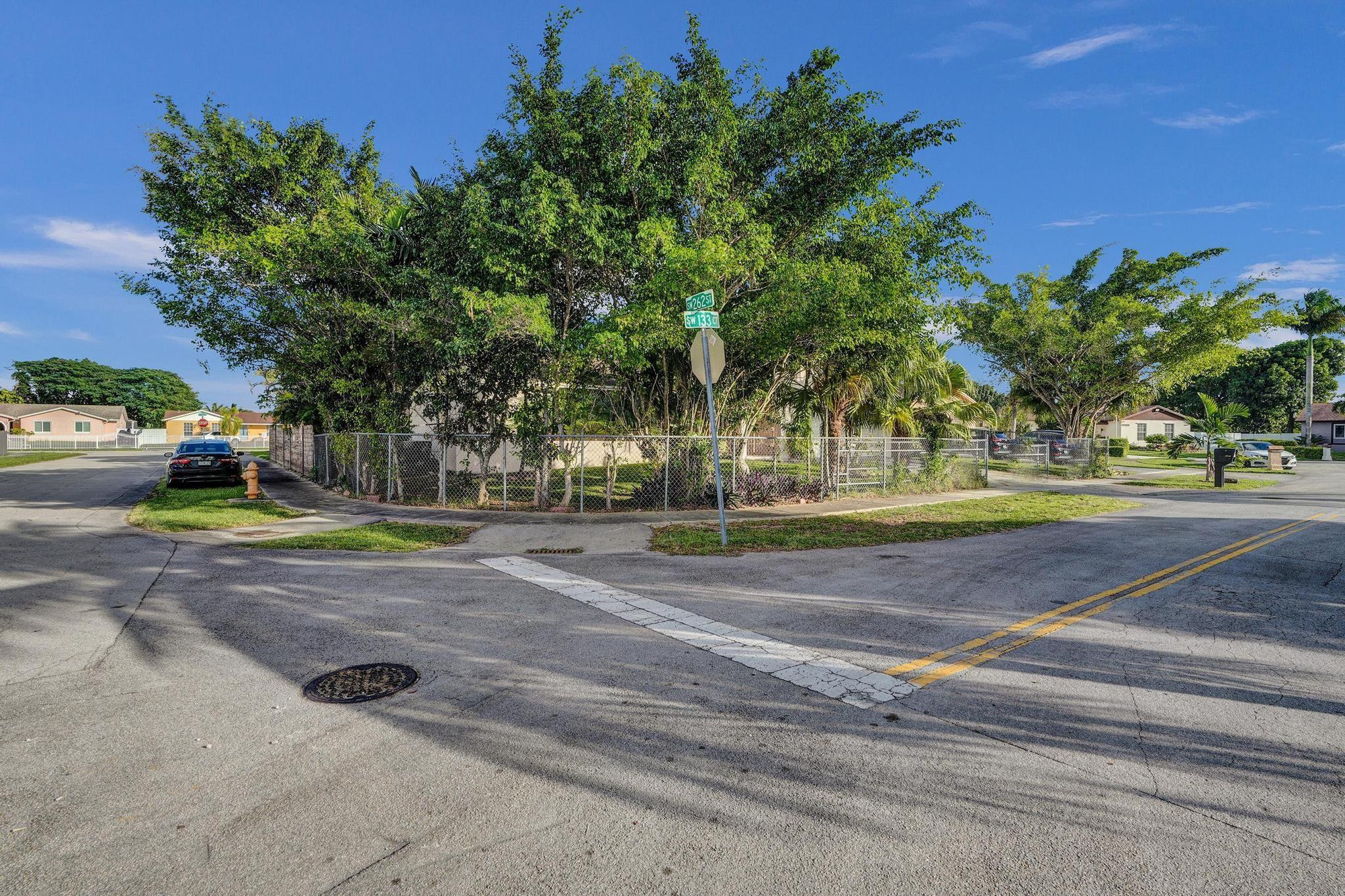 26205 Southwest 133rd Court Homestead, FL 33032 - Photo 1 of 45 a view of a yard with basketball court