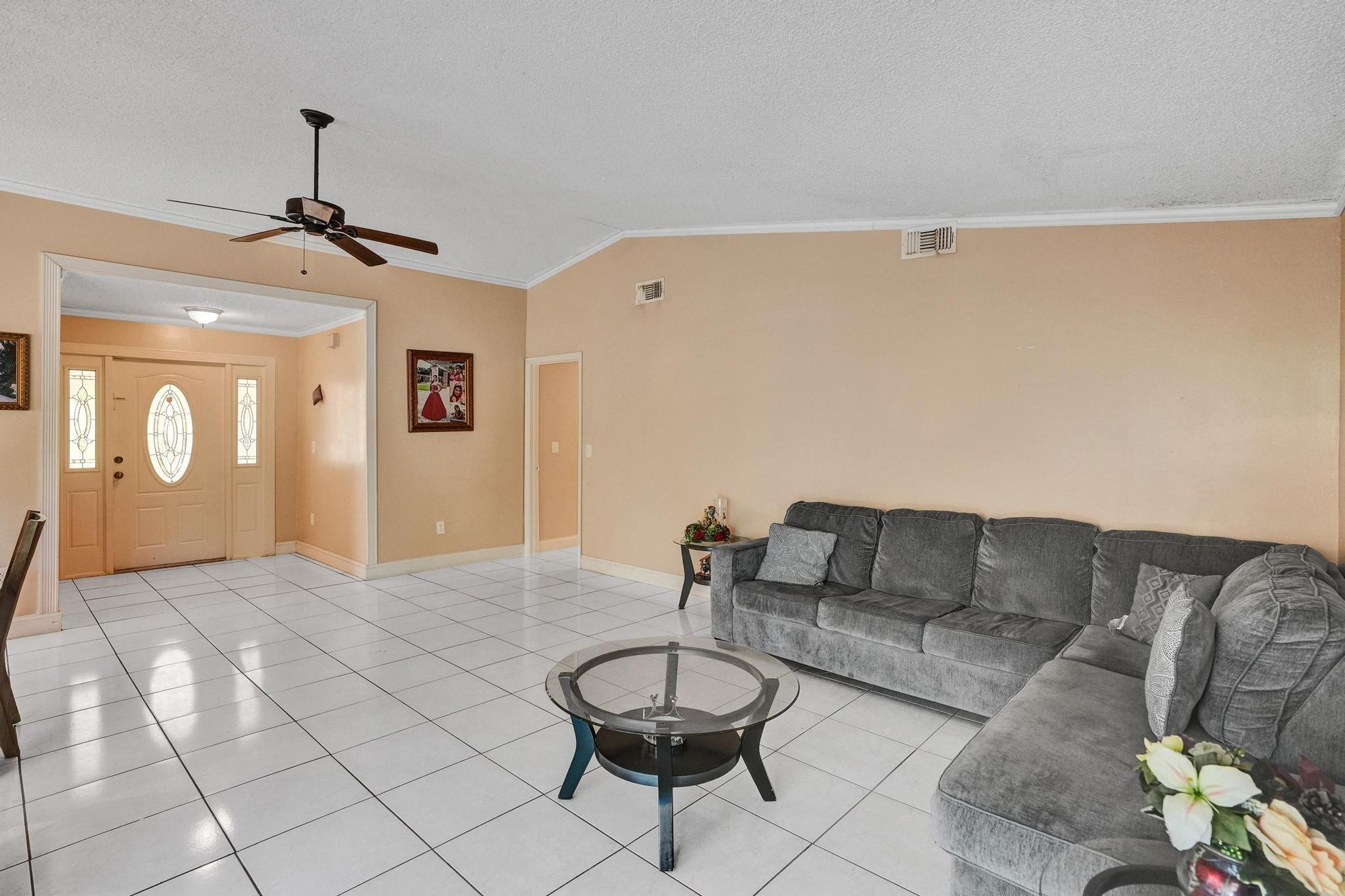 26205 Southwest 133rd Court Homestead, FL 33032 - Photo 15 of 45 a living room with furniture and a dining table