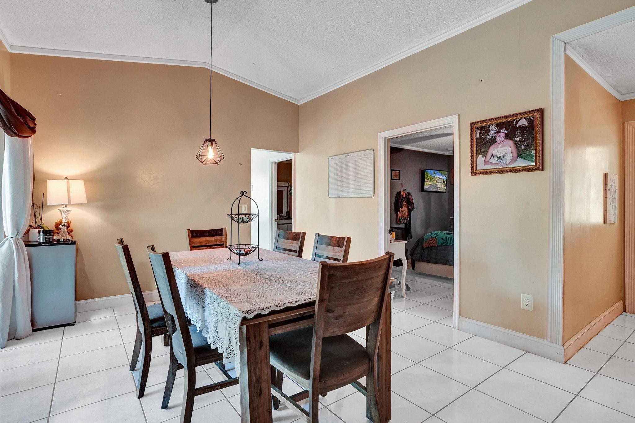 26205 Southwest 133rd Court Homestead, FL 33032 - Photo 20 of 45 a view of a dining room with furniture