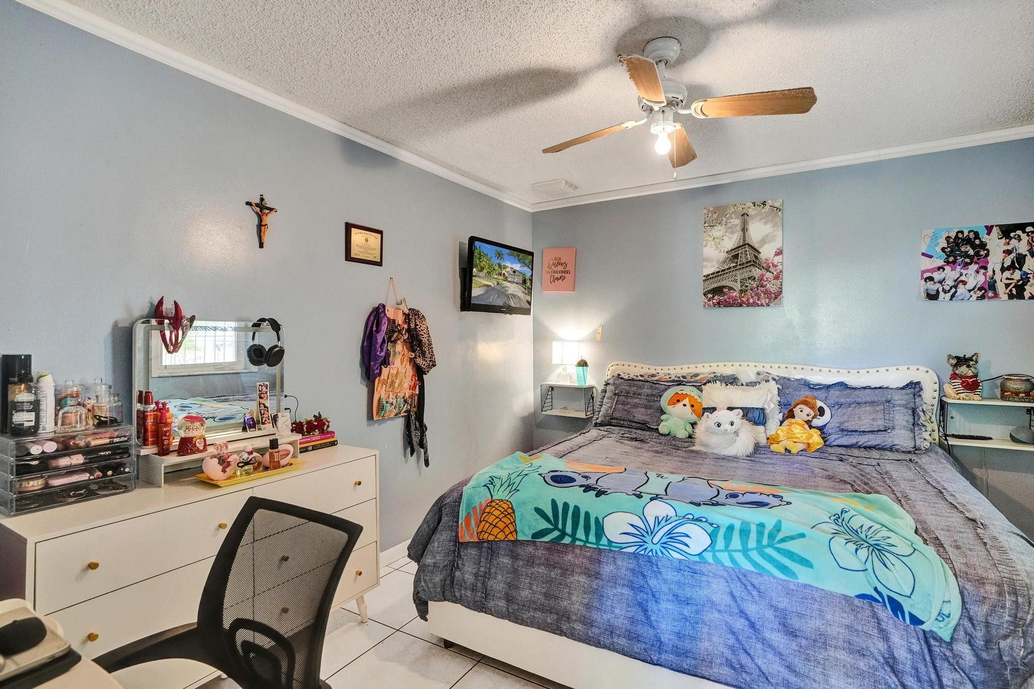 26205 Southwest 133rd Court Homestead, FL 33032 - Photo 30 of 45 a bedroom with furniture and a bed