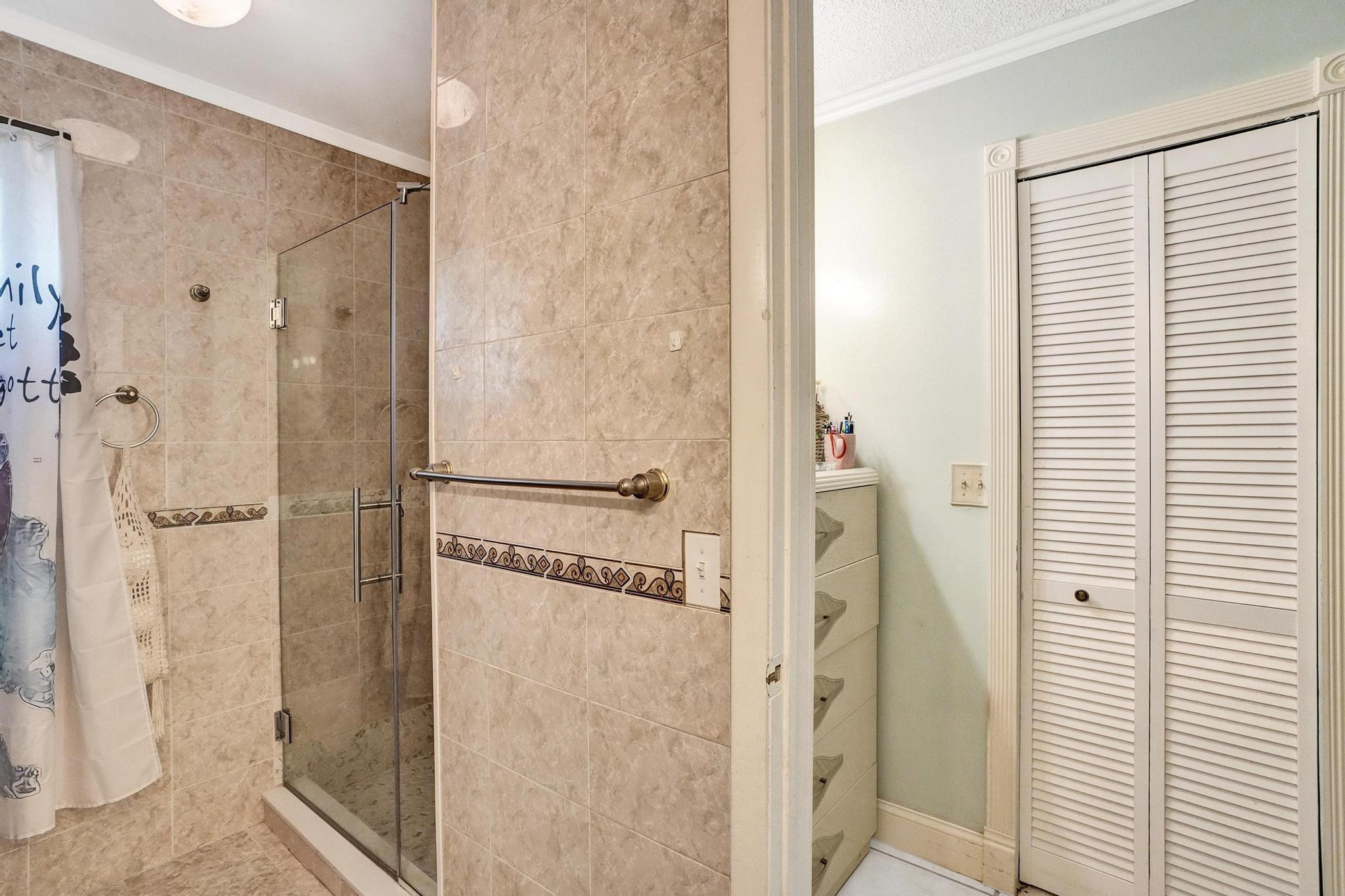 26205 Southwest 133rd Court Homestead, FL 33032 - Photo 34 of 45 a bathroom with a shower and a sink