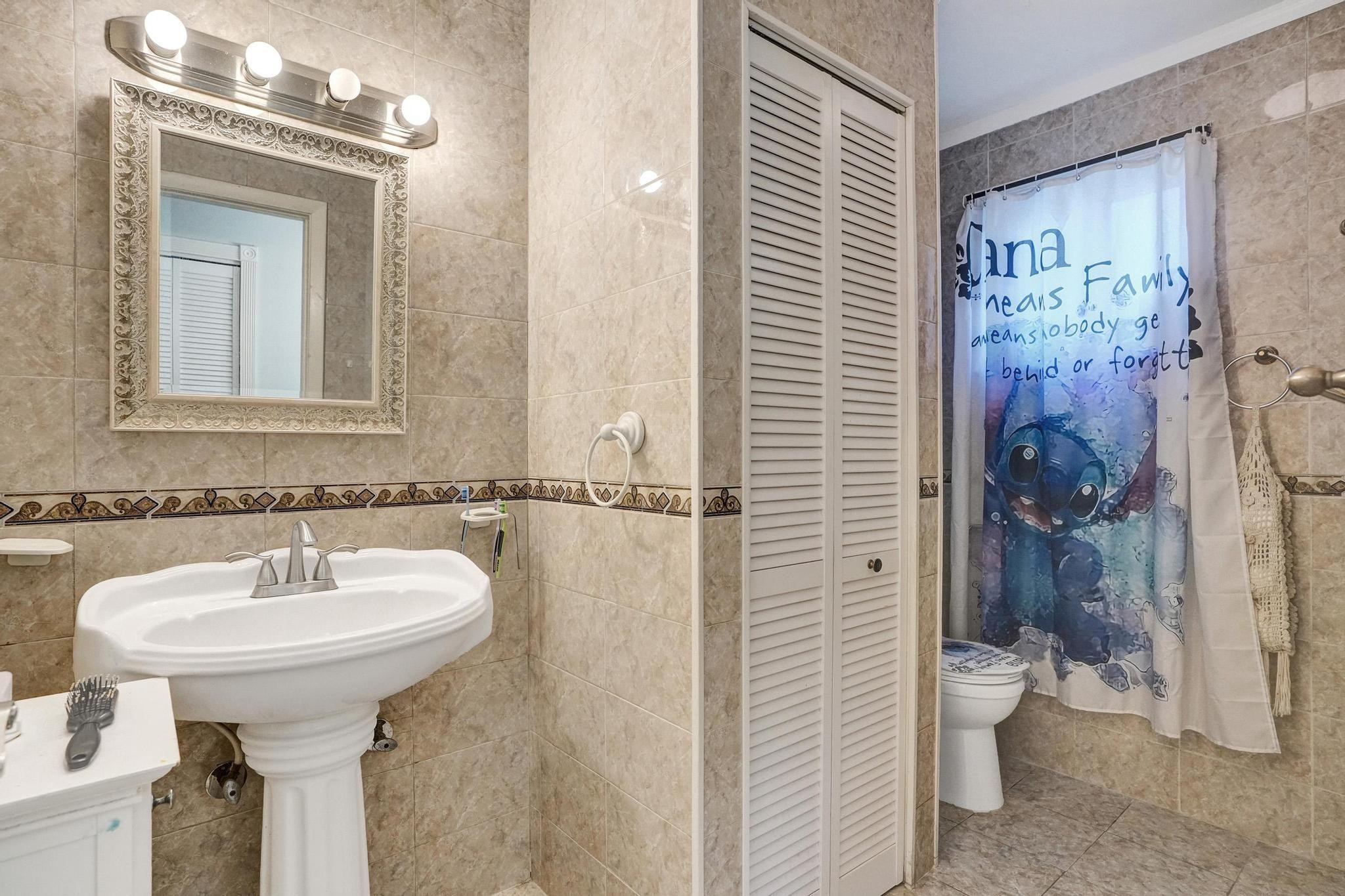 26205 Southwest 133rd Court Homestead, FL 33032 - Photo 35 of 45 a bathroom with a sink toilet and shower